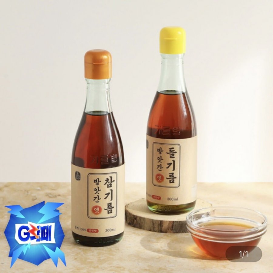 300ml dầu mè ép lạnh + 300ml dầu tía tô