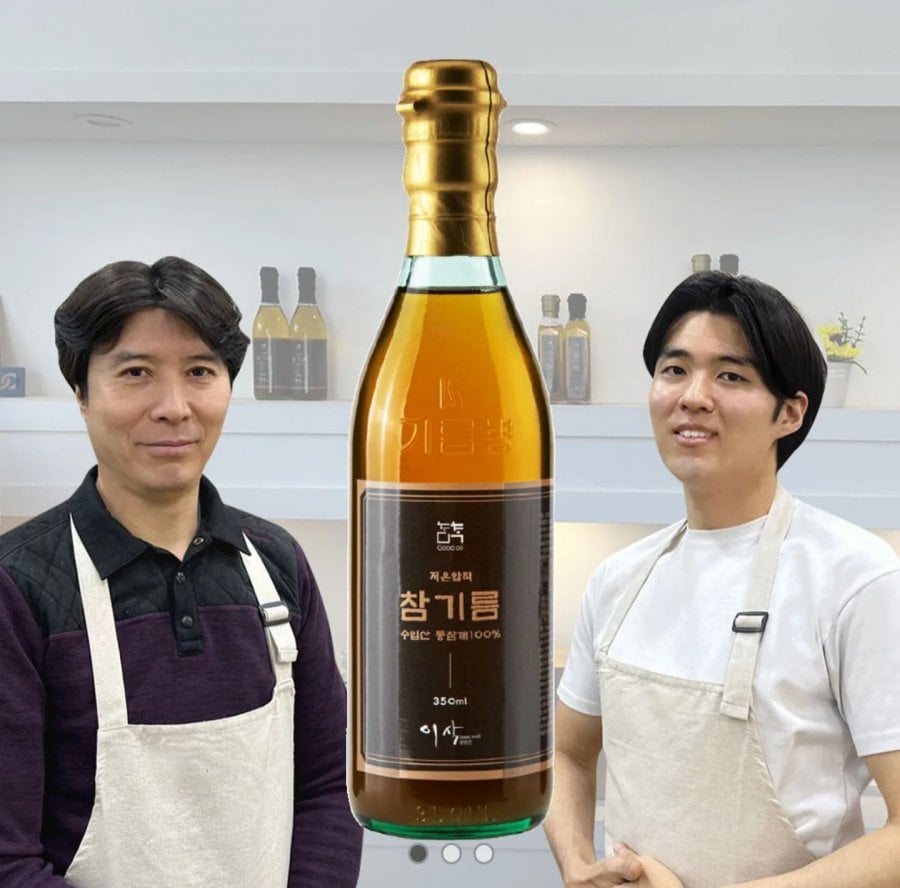 2 lon dầu mè ép lạnh Isaac Mill + mè rang